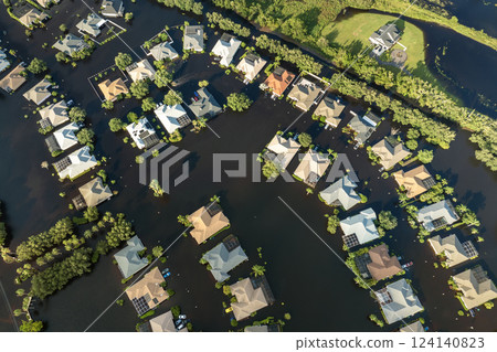 Flooding in Florida caused by tropical storm from hurricane Debby. Suburb houses in Laurel Meadows residential community surrounded by flood waters in Sarasota. Aftermath of natural disaster 124140823
