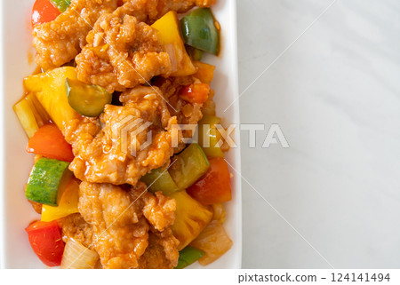 Stir fried sweet and sour sauce with pork Stir fried sweet and sour sauce with pork 124141494