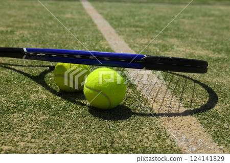 The main attributes of big tennis, racket and ball. 124141829