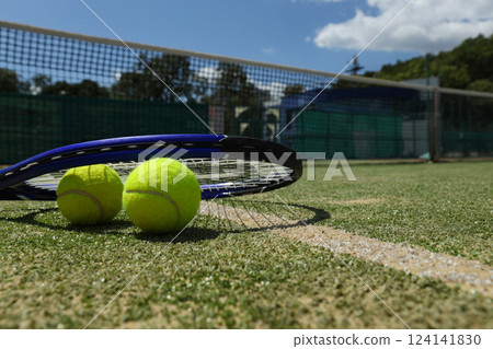 The main attributes of big tennis, racket and ball. The main attributes of big tennis, racket and ball. 124141830