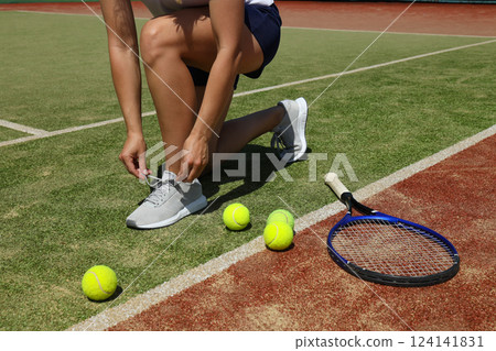 The main attributes of big tennis, racket and ball. The main attributes of big tennis, racket and ball. 124141831