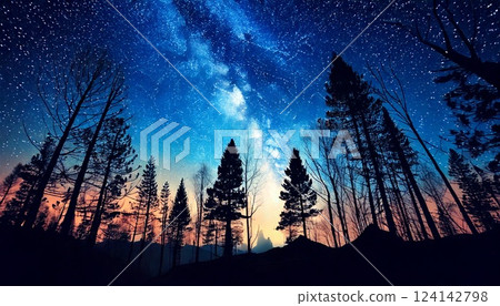 A fantastical and mysterious starry sky emerging from the forest 124142798