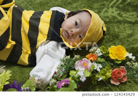 Baby cosplaying as a bee Baby cosplaying as a bee 124143429