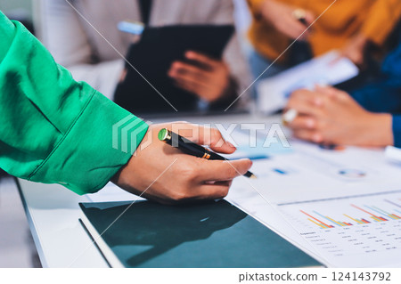 business people in meeting discussing plans together 124143792