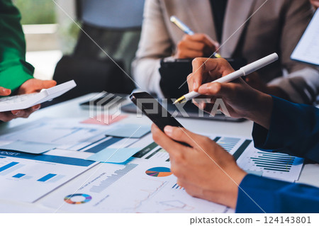 business people in meeting discussing plans together business people in meeting discussing plans together 124143801