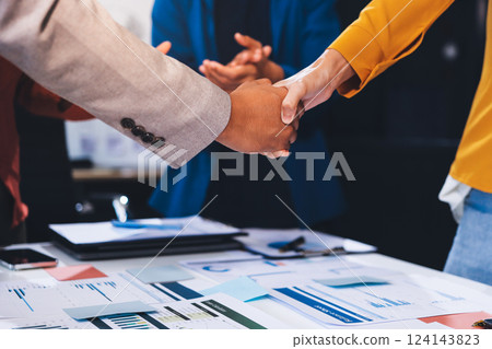 Business handshake for teamwork of business merger and acquisition,successful negotiate,hand shake,two businessman shake hand with partner to celebration partnership and business deal concept 124143823