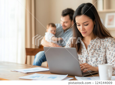 Cinematic scene of determined woman balancing work and family life, work from home concept. 124144009