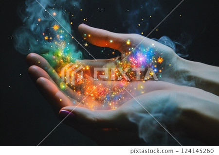 Hands filled with colorful sparkles and swirling smoke create an enchanting visual effect in a dark setting Hands filled with colorful sparkles and swirling smoke create an enchanting visual effect in a dark setting 124145260