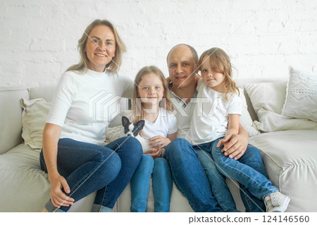 Portrait of happy family. Woman, man and children Portrait of happy family. Woman, man and children 124146560