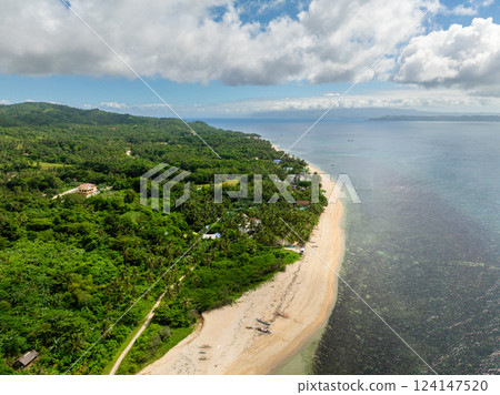 White sand beach in tropical island. Blue sky and clouds. Lanas, San Jose. Romblon, Philippines. 124147520