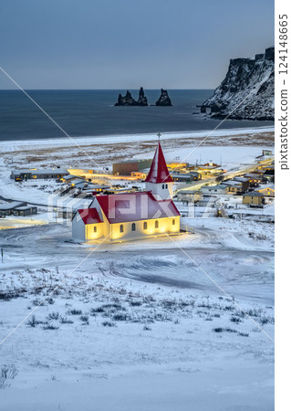 View of Vkurkirkja or Vik I Myrdal church building in the Vik village. The southernmost village in Iceland. Nature, religion, travel, winter background, or wallpaper View of Vkurkirkja or Vik I Myrdal church building in the Vik village. The southernmost village in Iceland. Nature, religion, travel, winter background, or wallpaper 124148665