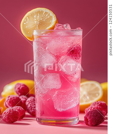 Vibrant Pink Lemonade Refreshment with Raspberries and Lemon Garnish on Red Background 124150531
