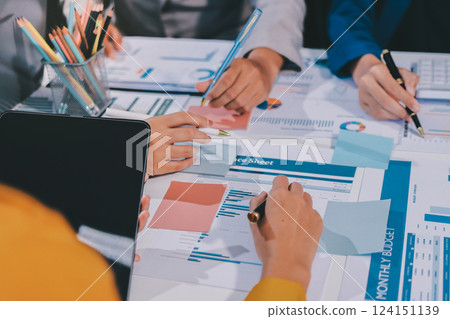 business people in meeting discussing plans together 124151139