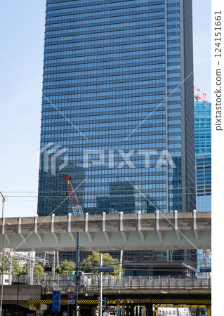Scenery of a railway overpass in a city with high-rise buildings Scenery of a railway overpass in a city with high-rise buildings 124151661