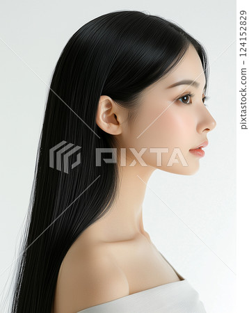 A woman with very straight long hair Vertical image Hair care image A woman with very straight long hair Vertical image Hair care image 124152829