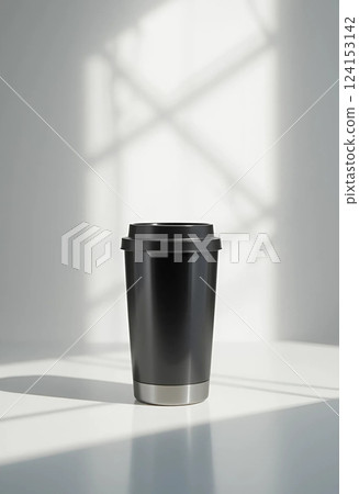 black coffee cup on white wooden table 124153142