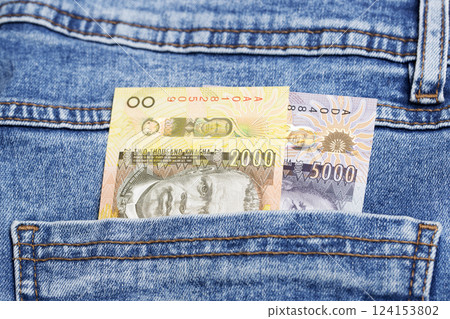 Malawian Kwacha in the pocket of blue jeans 124153802