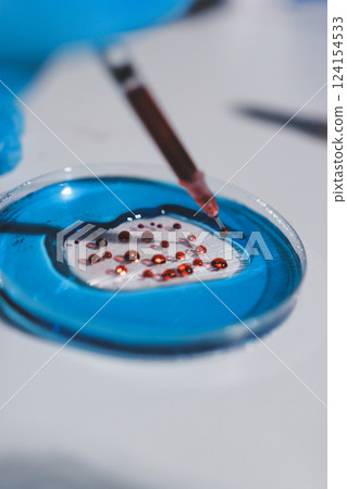 Researchers working in the clinical laboratory 124154533