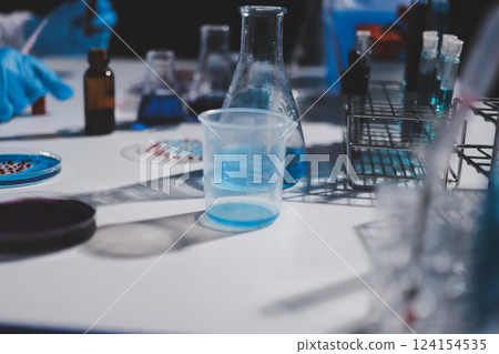 Researchers working in the clinical laboratory Researchers working in the clinical laboratory 124154535