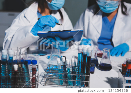 Researchers working in the clinical laboratory 124154536
