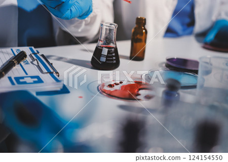 Researchers working in the clinical laboratory 124154550