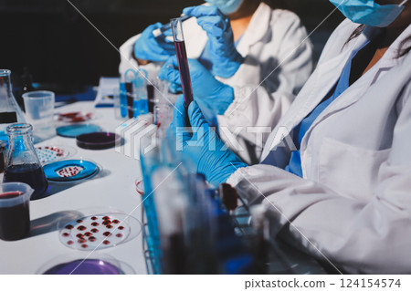 Researchers working in the clinical laboratory 124154574