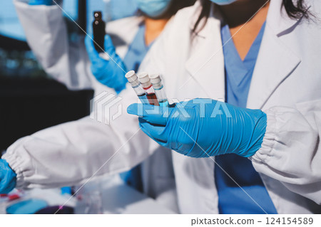 Researchers working in the clinical laboratory 124154589