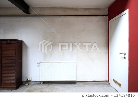 Dirty white wall in grungy loft with moisture and spider web 124154810