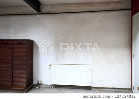 Dirty white wall in grungy loft with moisture and spider web Dirty white wall in grungy loft with moisture and spider web 124154812
