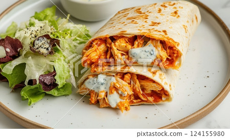 AI generated Buffalo chicken crunch wrap served with fresh salad and dipping sauce 124155980