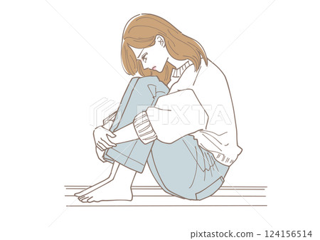 A young woman sitting on the floor and feeling depressed A young woman sitting on the floor and feeling depressed 124156514