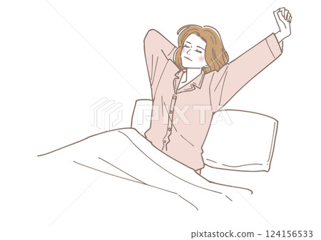 A woman who wakes up refreshed in the morning and stretches A woman who wakes up refreshed in the morning and stretches 124156533