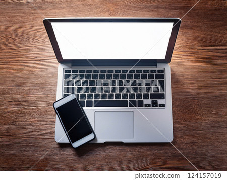 Laptop and smartphone on the desk 124157019