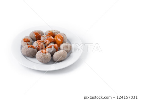 Papas arrugadas with mojo isolated on white background Papas arrugadas with mojo isolated on white background 124157031