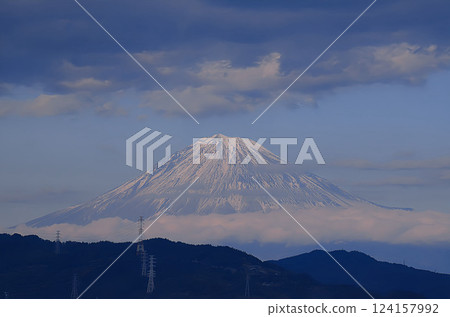 Mount Fuji in winter floating in the clouds 124157992