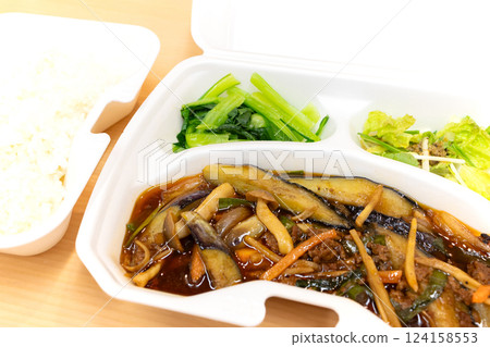 Rice and delicious eggplant and minced pork stir-fry in a spicy Sichuan style bento Rice and delicious eggplant and minced pork stir-fry in a spicy Sichuan style bento 124158553