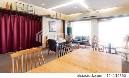 Interior image of the cafe space with bright light pouring in 124159860