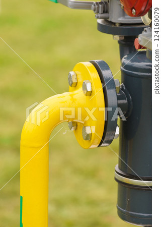 Metal pipe with valves and screws. Metal pipe with valves and screws. 124160079