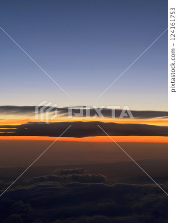 Sunset from the airplane window 124161753