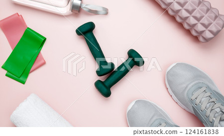 Various accessories for sports and fitness, including sneakers, dumbbells, foam roller for myofascial release, resistance bands, water bottle, towel Various accessories for sports and fitness, including sneakers, dumbbells, foam roller for myofascial release, resistance bands, water bottle, towel 124161838