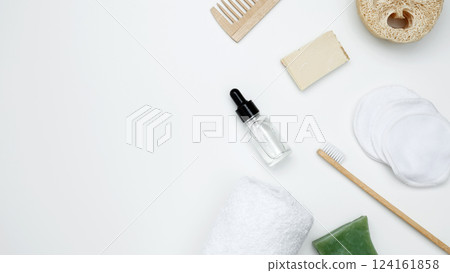 Embodying a sustainable self-care concept, eco-friendly beauty essentials, face serum, loofah, including bamboo toothbrush Embodying a sustainable self-care concept, eco-friendly beauty essentials, face serum, loofah, including bamboo toothbrush 124161858