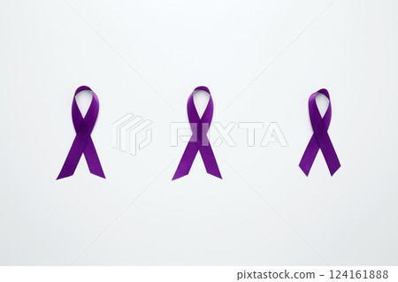 Purple Epilepsy Awareness Day, purple ribbon held, symbol of support 124161888