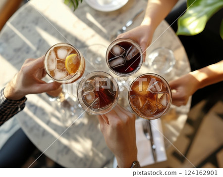A trendy cafe scene with Carajillo cocktails being served to guests, after-dinner coffee cocktail 124162901