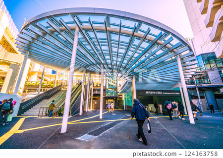 Yokohama cityscape in Japan: The well-maintained Kita-Nishiguchi exit of Yokohama Station. The large roof is impressive... Yokohama cityscape in Japan: The well-maintained Kita-Nishiguchi exit of Yokohama Station. The large roof is impressive... 124163758