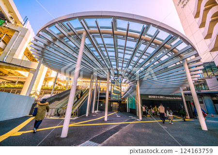 Yokohama cityscape in Japan: The well-maintained Kita-Nishiguchi exit of Yokohama Station. The large roof is impressive... Yokohama cityscape in Japan: The well-maintained Kita-Nishiguchi exit of Yokohama Station. The large roof is impressive... 124163759