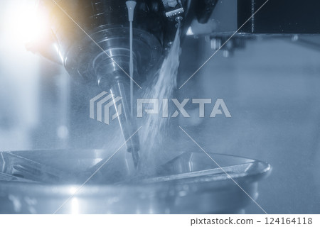 The 5-axis CNC milling machine cutting the magnesium alloy wheel part with solid ball end mill tool. The 5-axis CNC milling machine cutting the magnesium alloy wheel part with solid ball end mill tool. 124164118