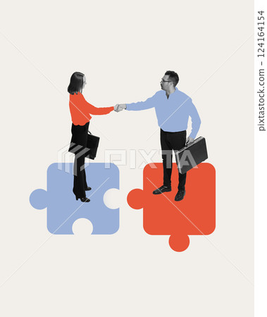 Successful deal. Business people shaking hands over interconnected puzzle pieces. Strategic alignment, collaborative decision-making 124164154