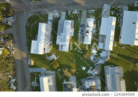 Destroyed by hurricane Ian suburban houses in Florida mobile home residential area. Consequences of natural disaster Destroyed by hurricane Ian suburban houses in Florida mobile home residential area. Consequences of natural disaster 124164504