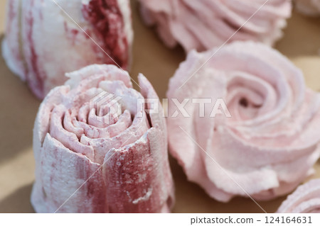 Marshmallow tulip. Homemade marshmallow laid out on the table to dry. Close-up. 124164631