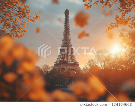 Stunning autumn sunset view of Eiffel Tower through colorful foliage in Paris 124164668